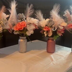 These mason jars are hand crafted with no-mess glitter and bedazzled rims!